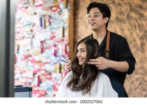 Asian Hairstylist Male Combing Using 260nw 2002527062